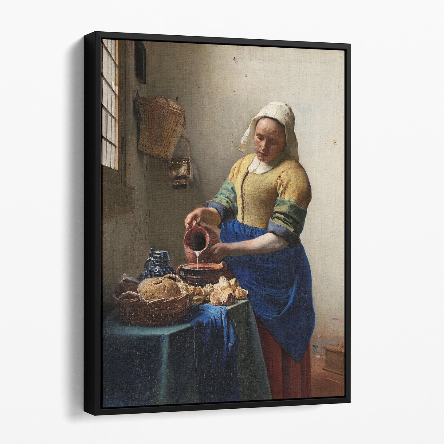 The Milkmaid by Johannes Vermeer