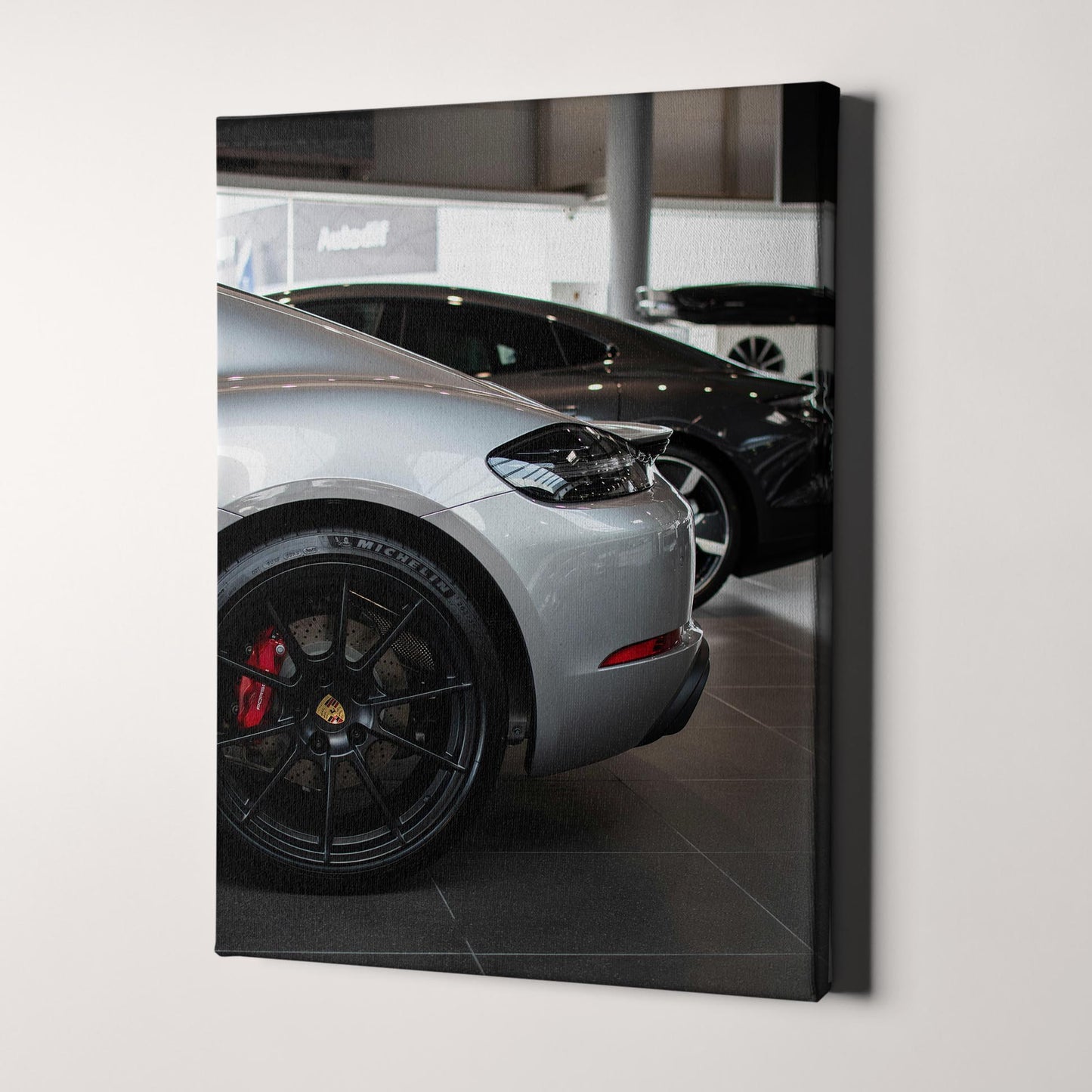 Silver Porsche in the Showroom