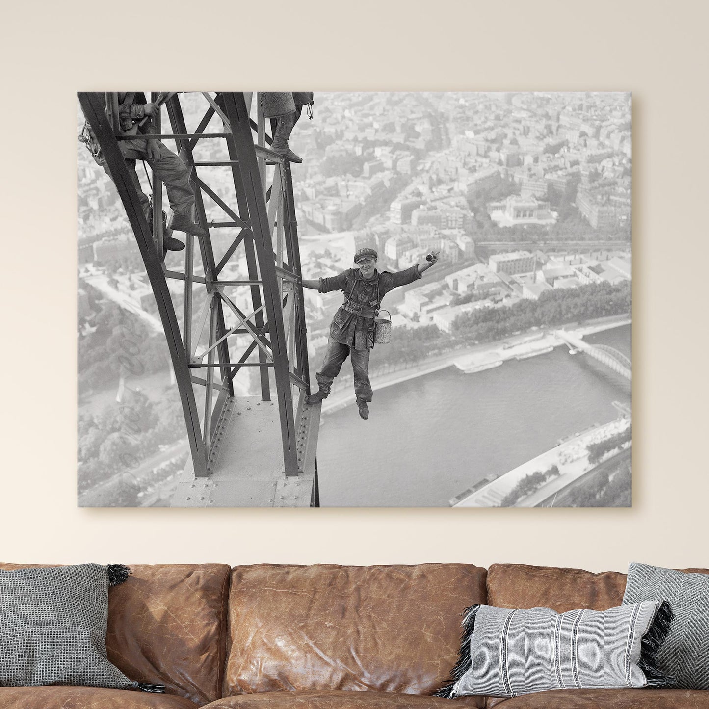 Worker Finishes Painting the Eiffel Tower