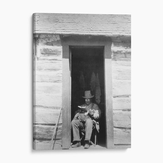 President Theodore Roosevelt Reading in Colorado with his Dog Skip, 1905