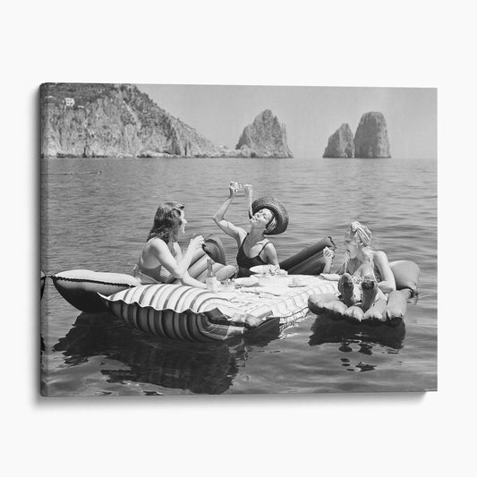 Three Women Eat Spaghetti Pasta On Lake Capri