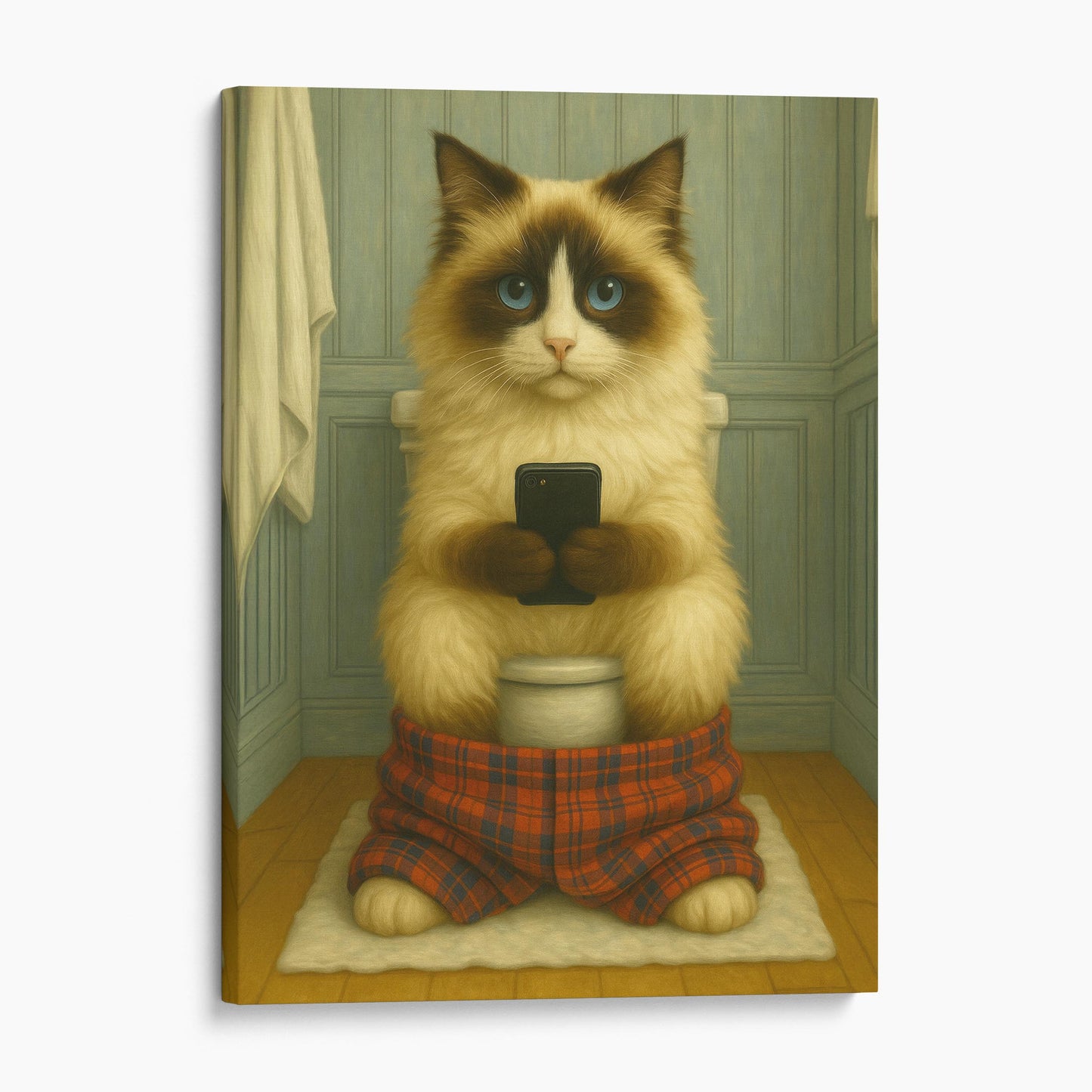 Ragdoll Cat On The Phone On The Toilet