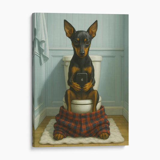Miniature Pinscher Dog On The Phone On The Toilet