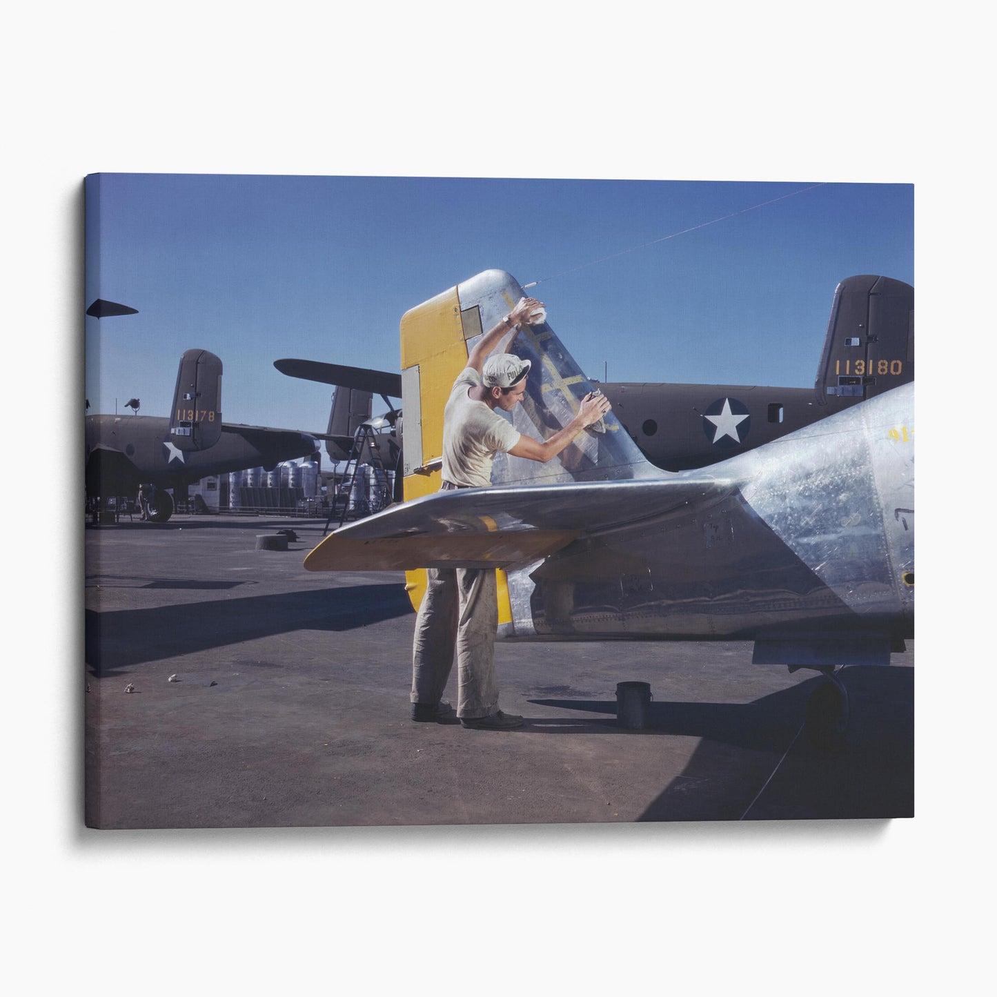 Cleaning the Tail of a P51 Fighter Plane, World War Two