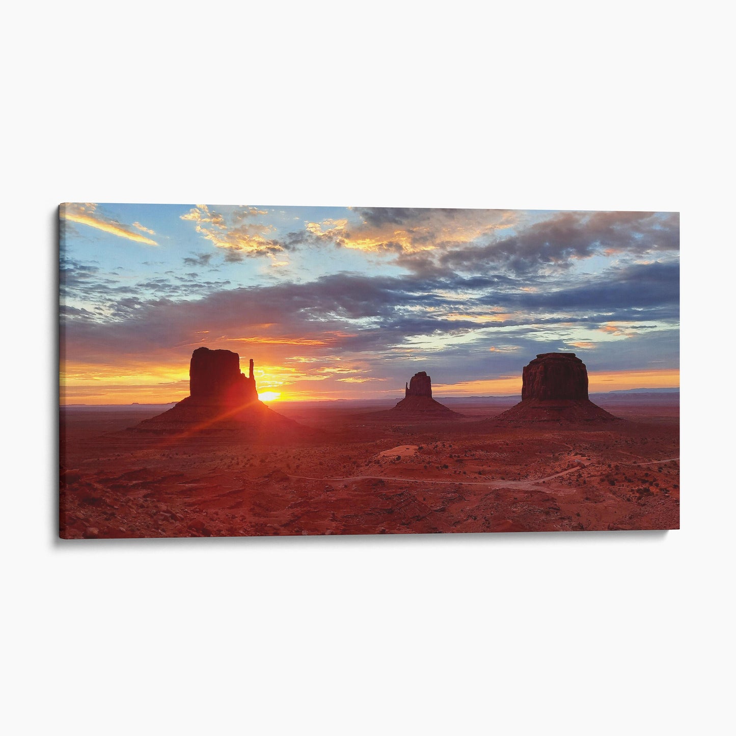 Sunrise by the Mitten Buttes in Monument Valley