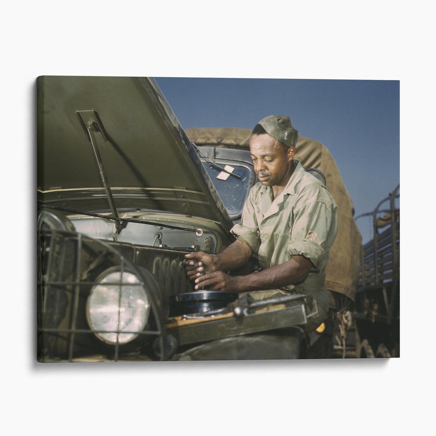 African American Mechanic Servicing a Jeep, World War Two