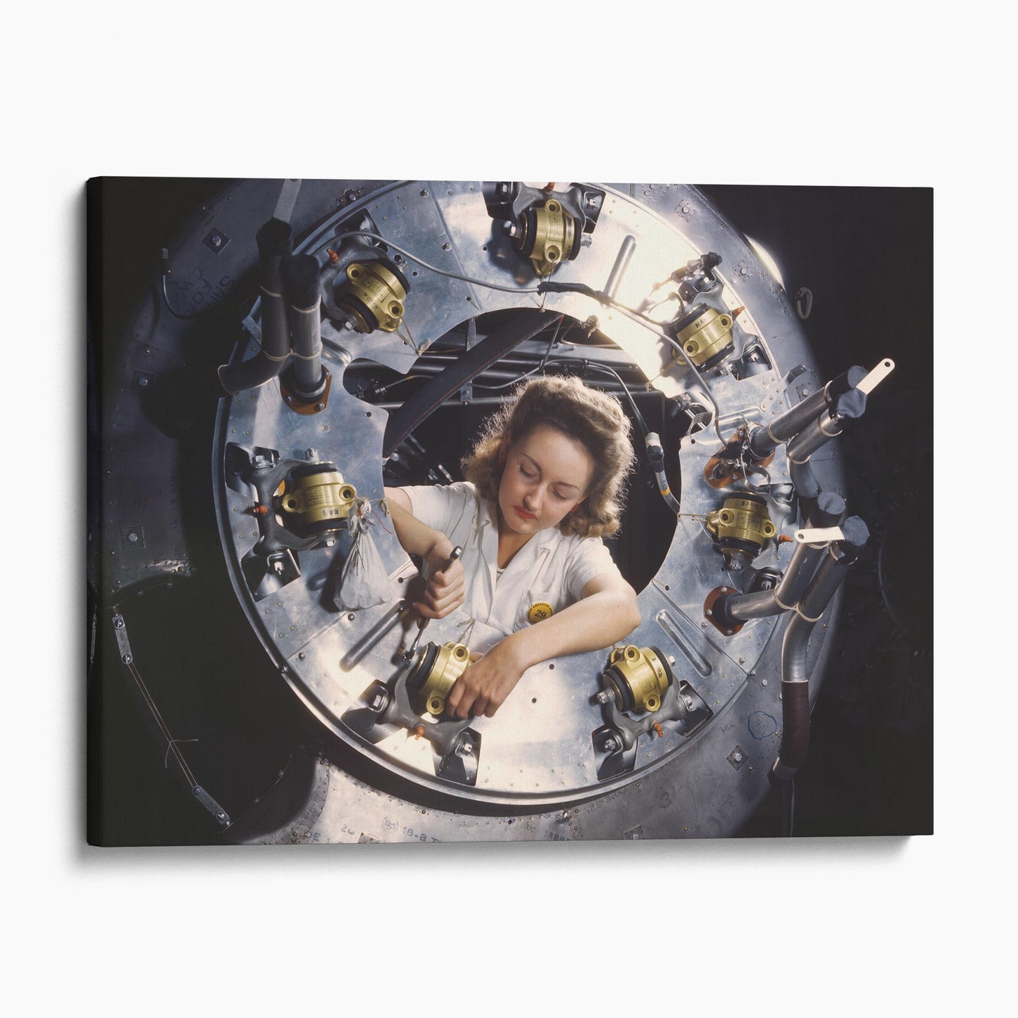 Woman Assembles a B25 Bomber Airplane, World War Two