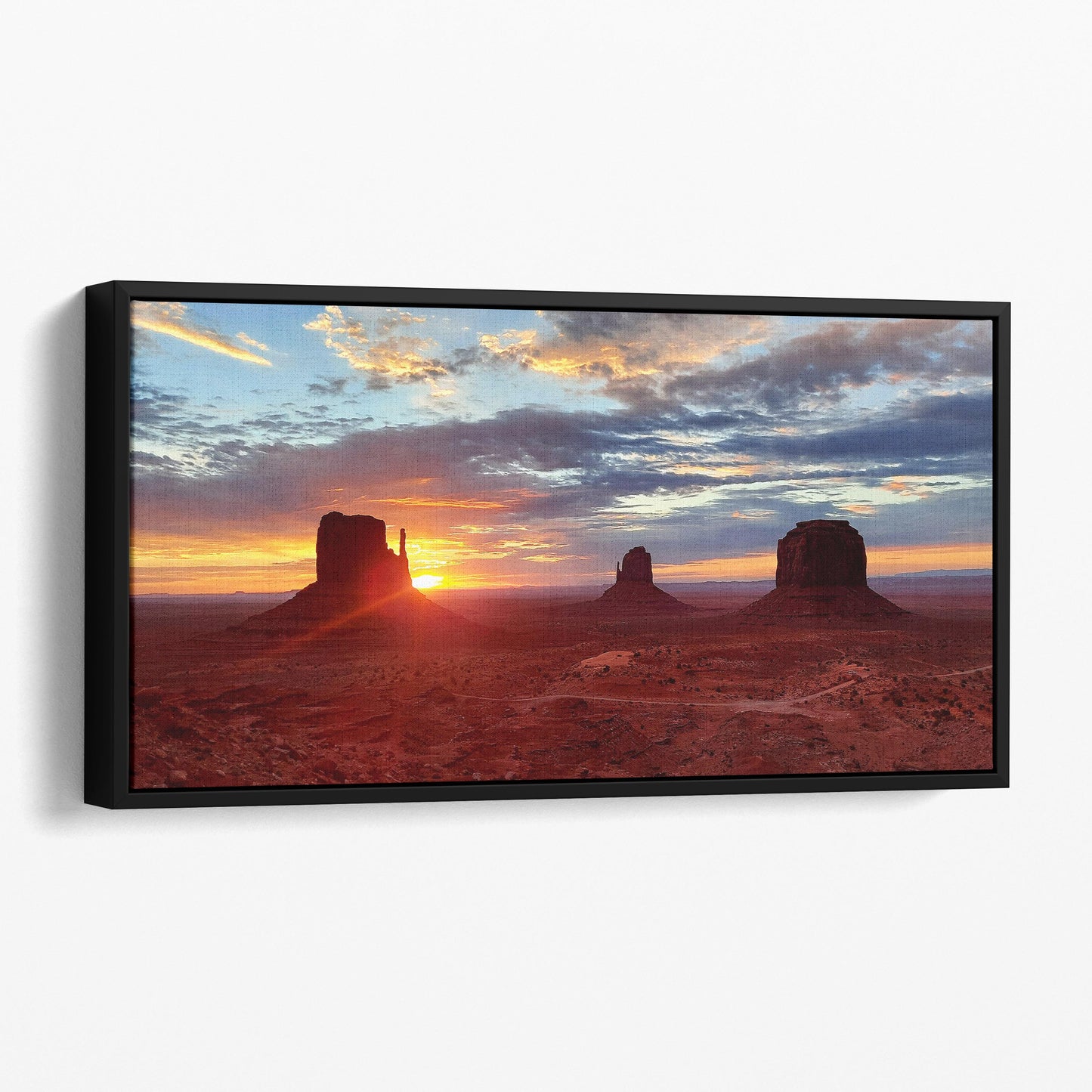Sunrise by the Mitten Buttes in Monument Valley