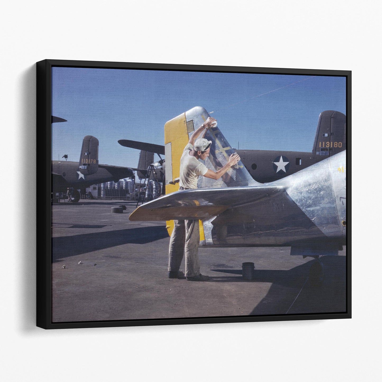 Cleaning the Tail of a P51 Fighter Plane, World War Two