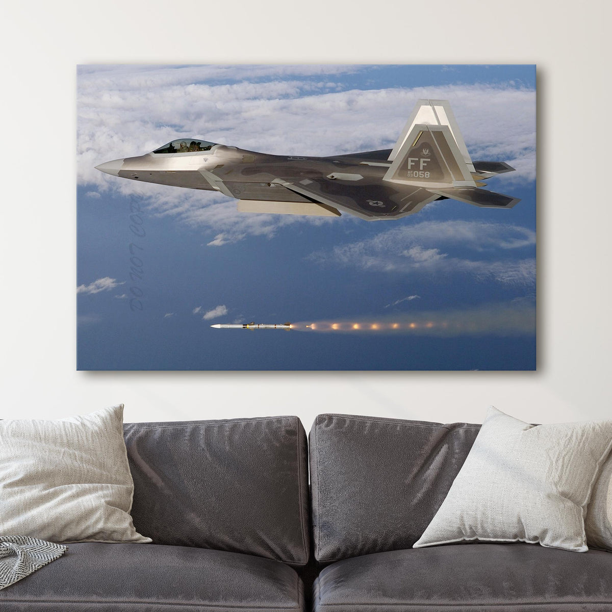 F-22 fires an AIM-120 AMRAAM missile