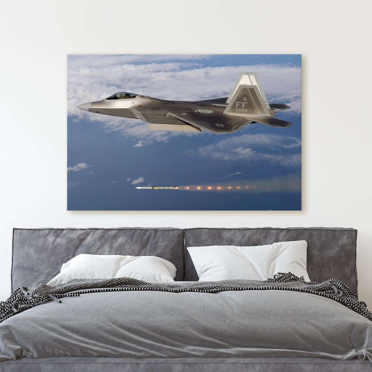 F-22 fires an AIM-120 AMRAAM missile